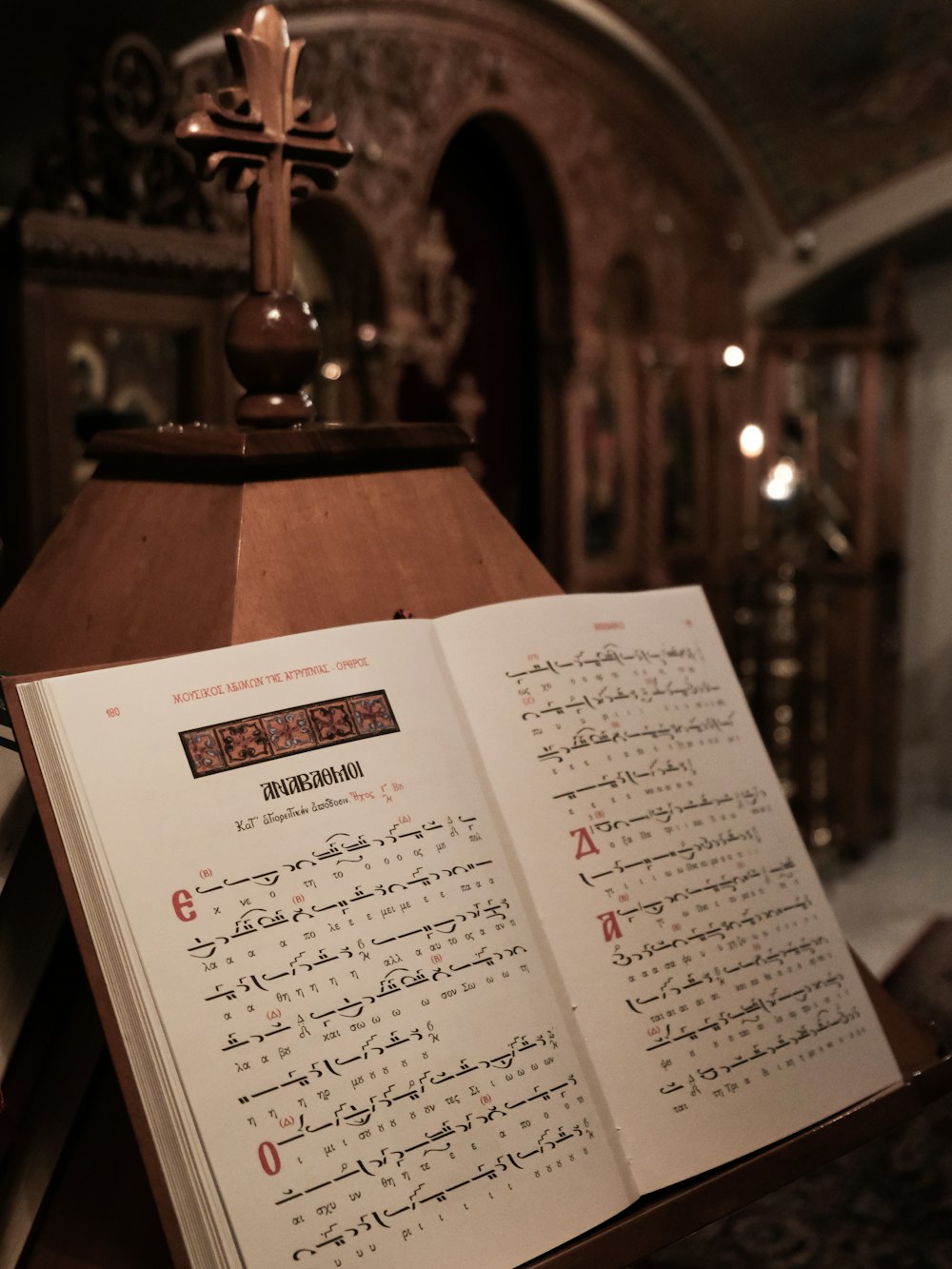 an open book sitting on top of a wooden table