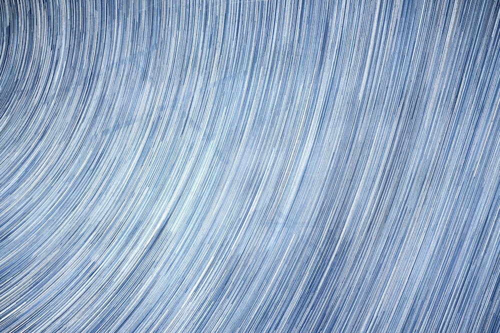 a close up of a blue background with lines