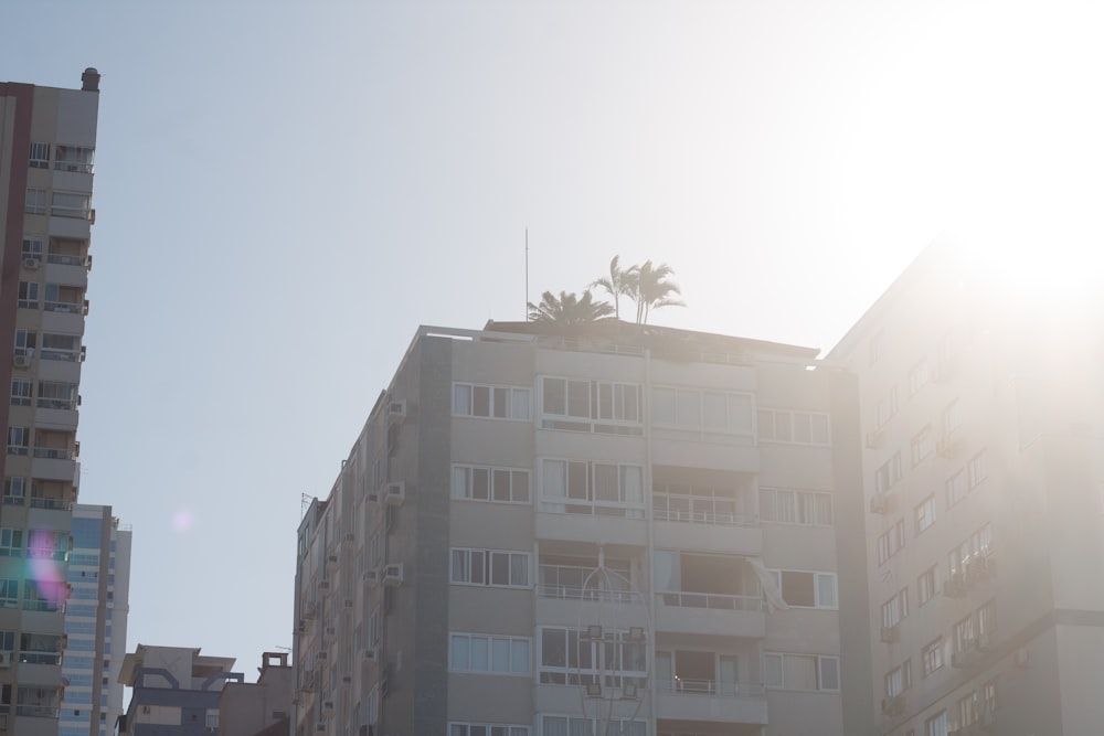 a tall building with balconies and balconies on top