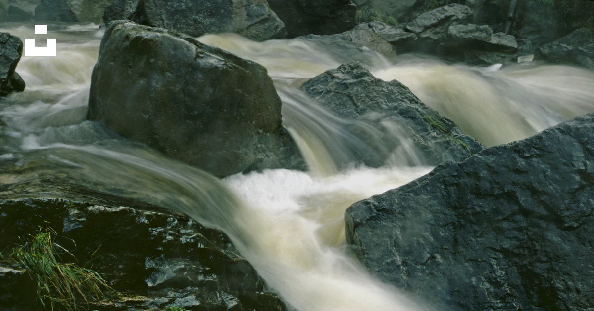 Large Rocks And Stream A stream of water running between large rocks photo – Free Nature ...