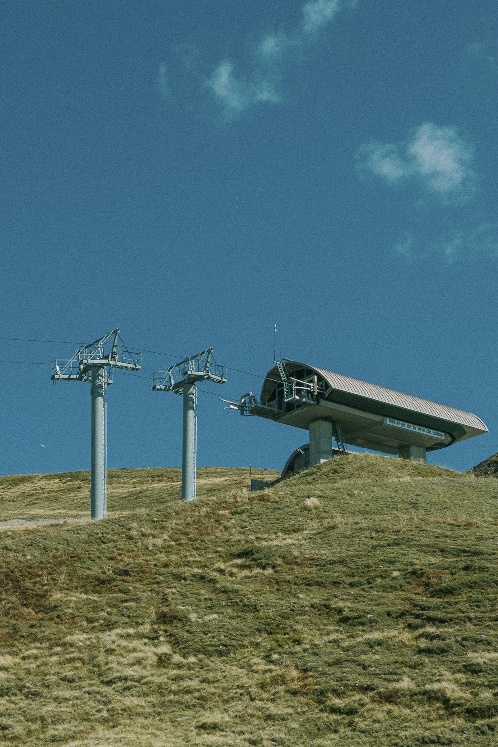 a couple of poles that are on a hill