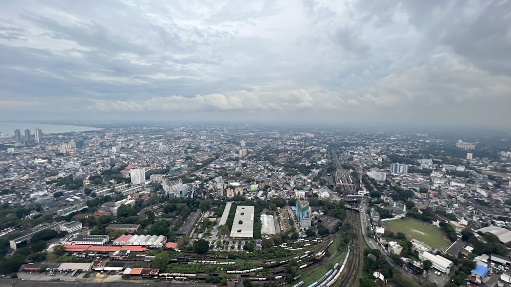 an aerial view of a city with a river running through it