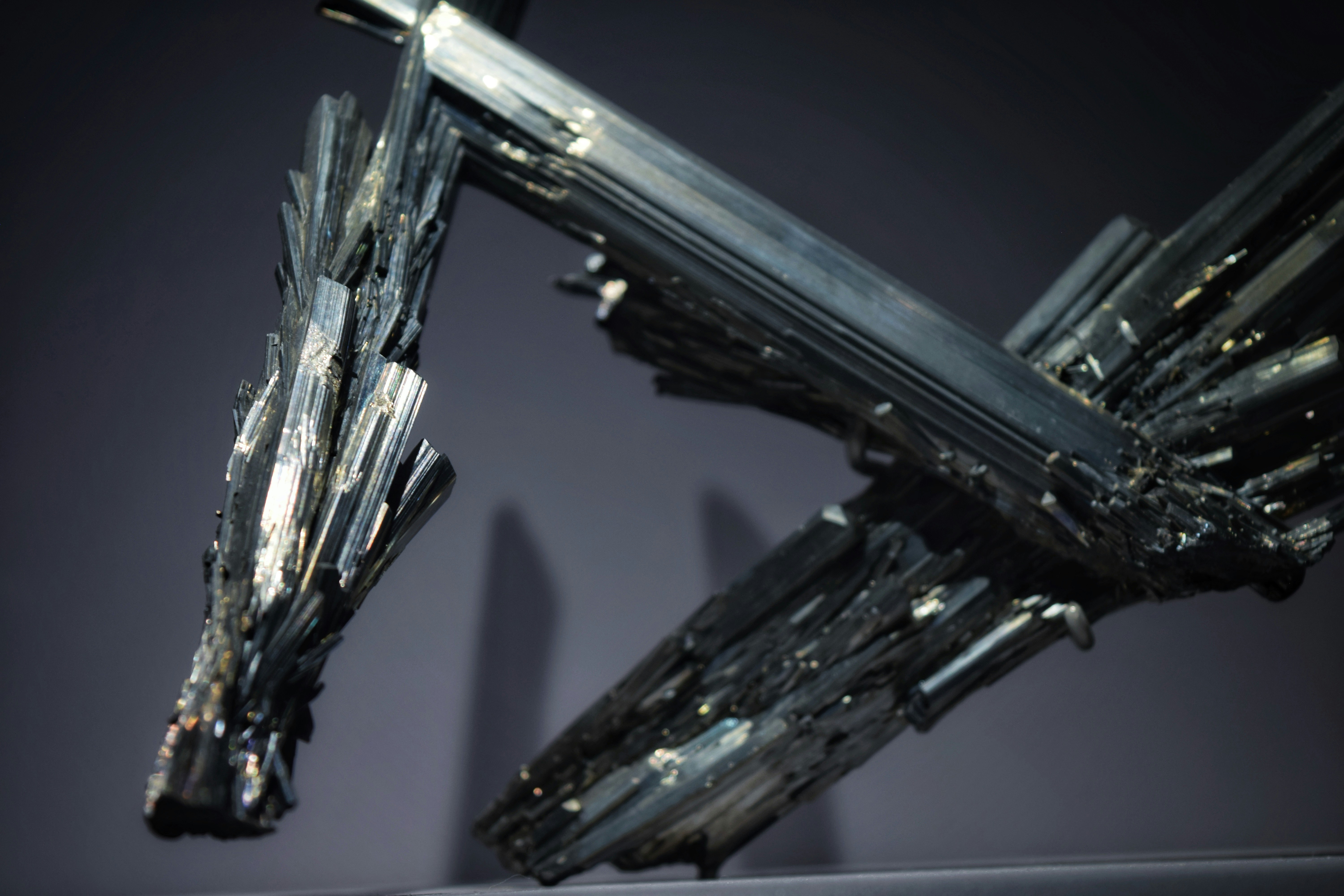 a sculpture of a metal structure on a table