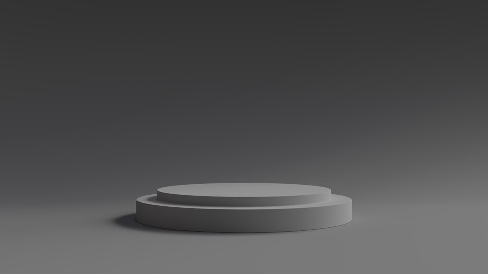 a white round object on a gray background
