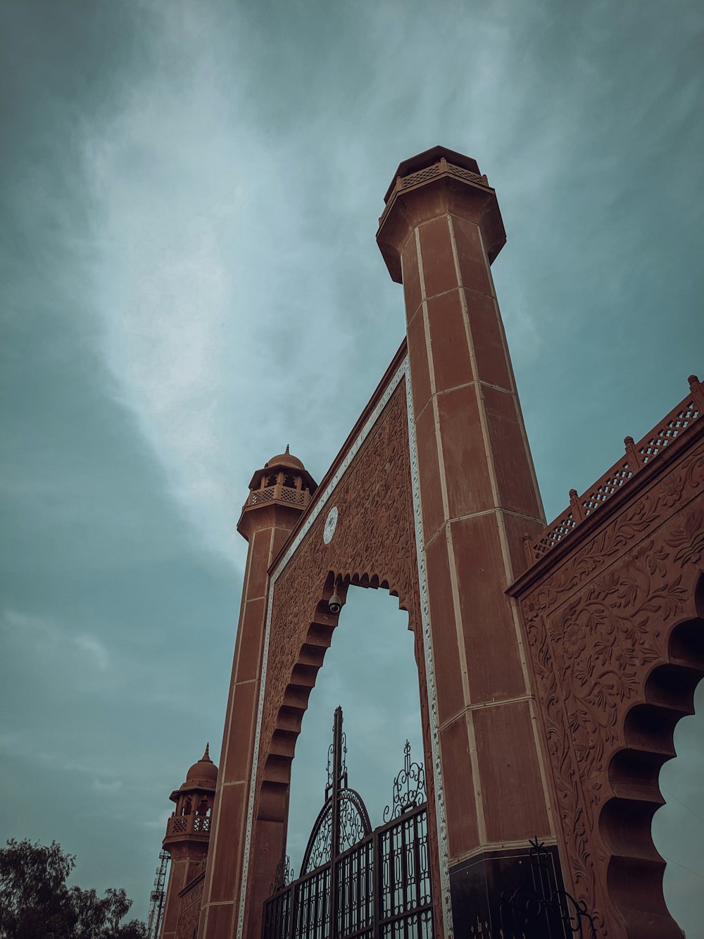 a tall tower with a clock on top of it