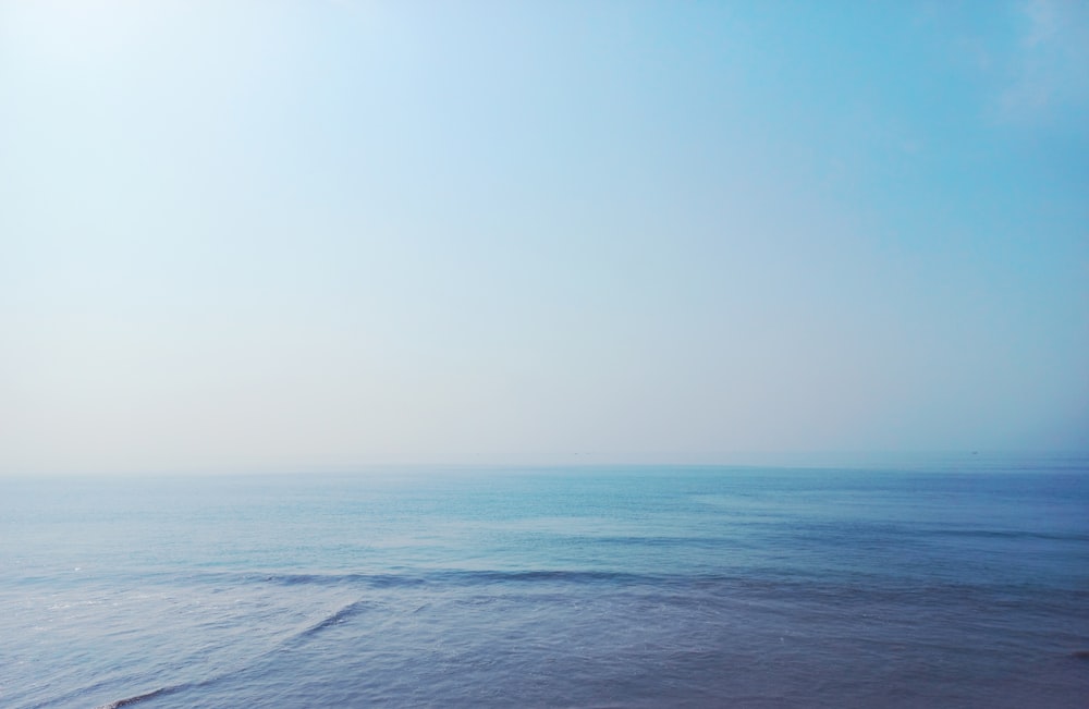 a view of the ocean from a beach