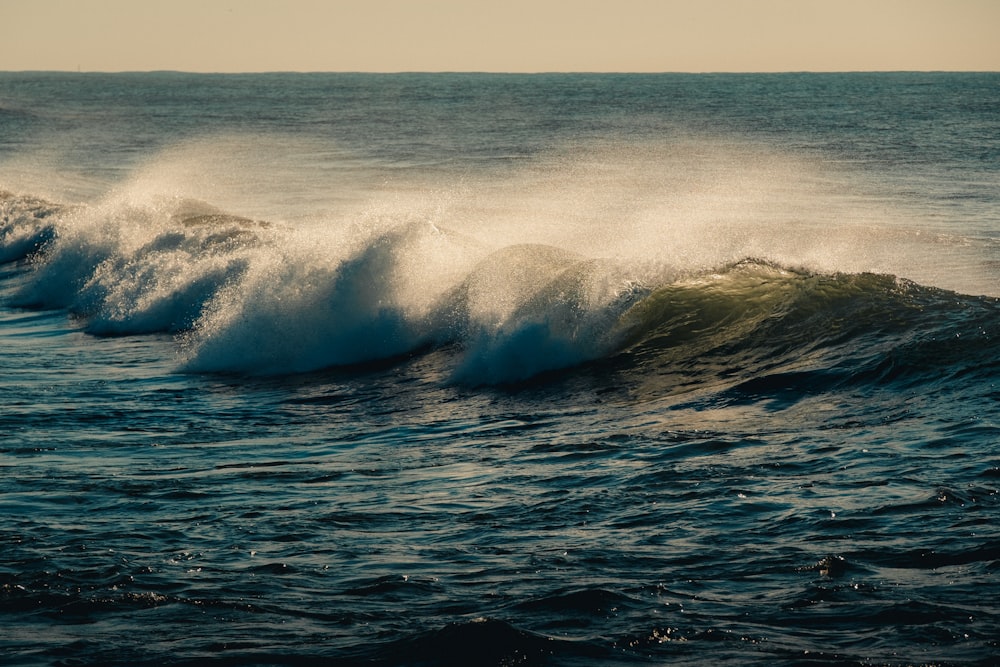 a group of large waves in the ocean