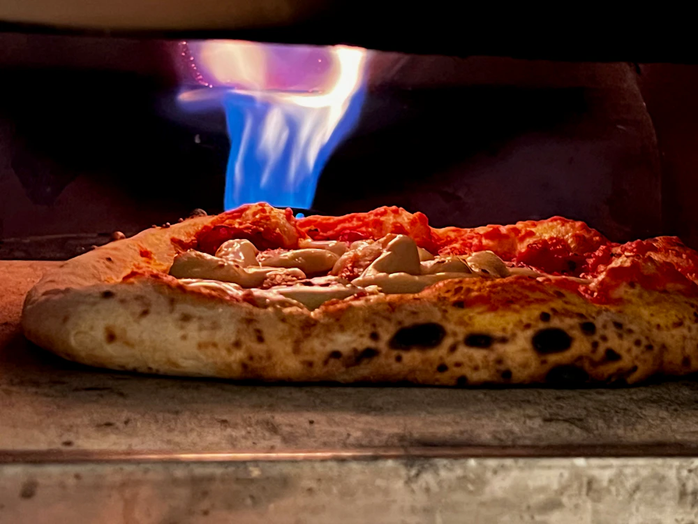 Pizza in cottura, fotografia illustrativa