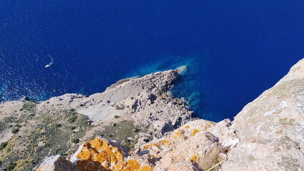 a view of a body of water from a cliff