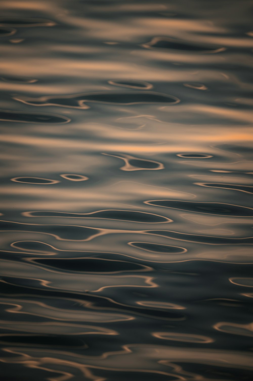 a large body of water with waves on it