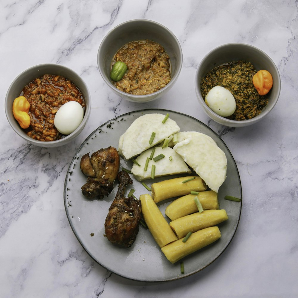 a plate of food that includes meat, rice and beans