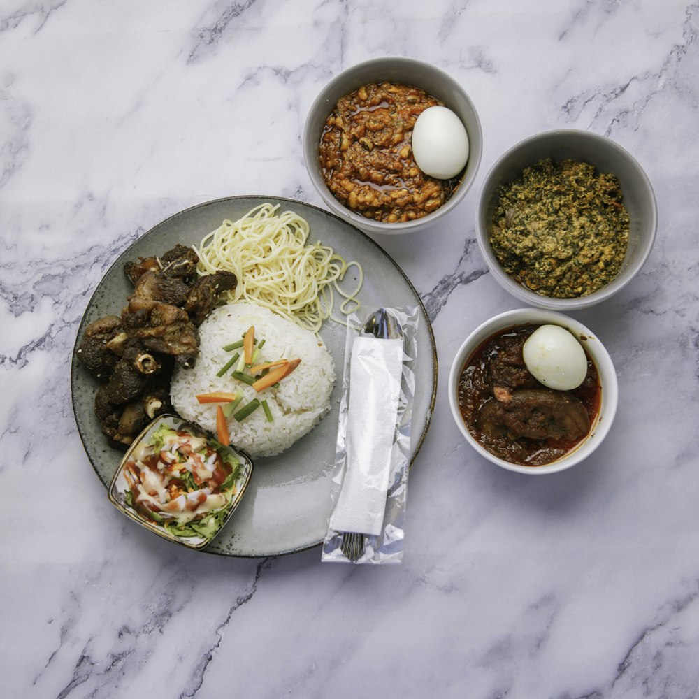 a plate of food on a marble table