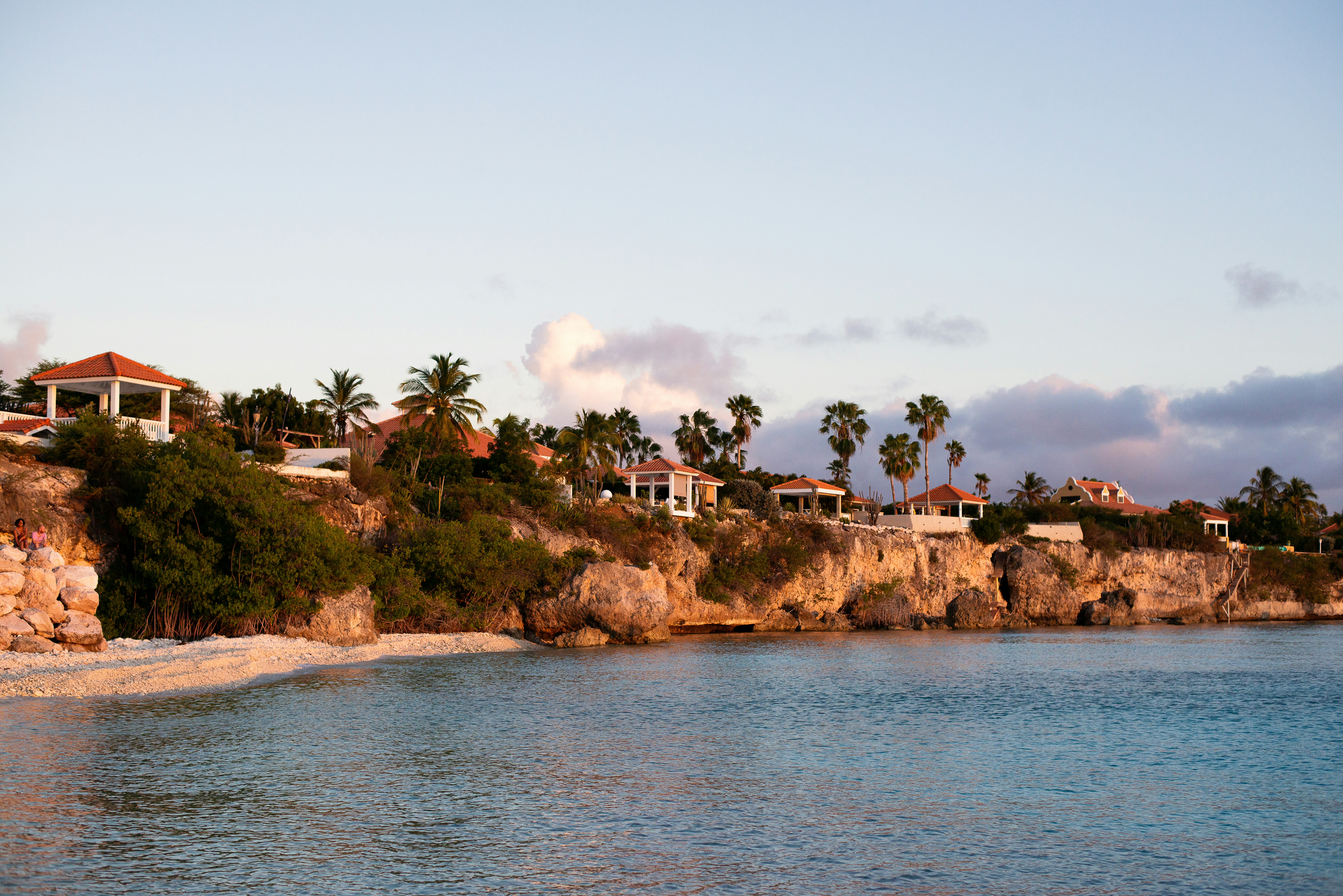 a house on a cliff overlooking the ocean