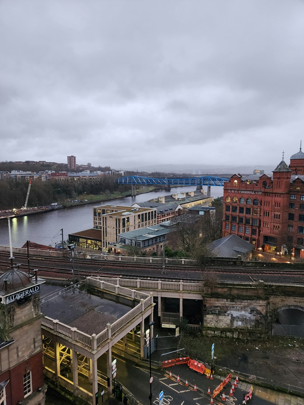 a view of a city with a bridge over a river