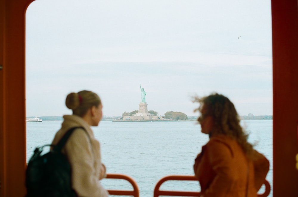 a couple of women standing next to each other