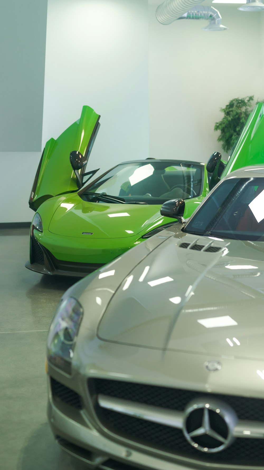 a couple of cars that are sitting in a room