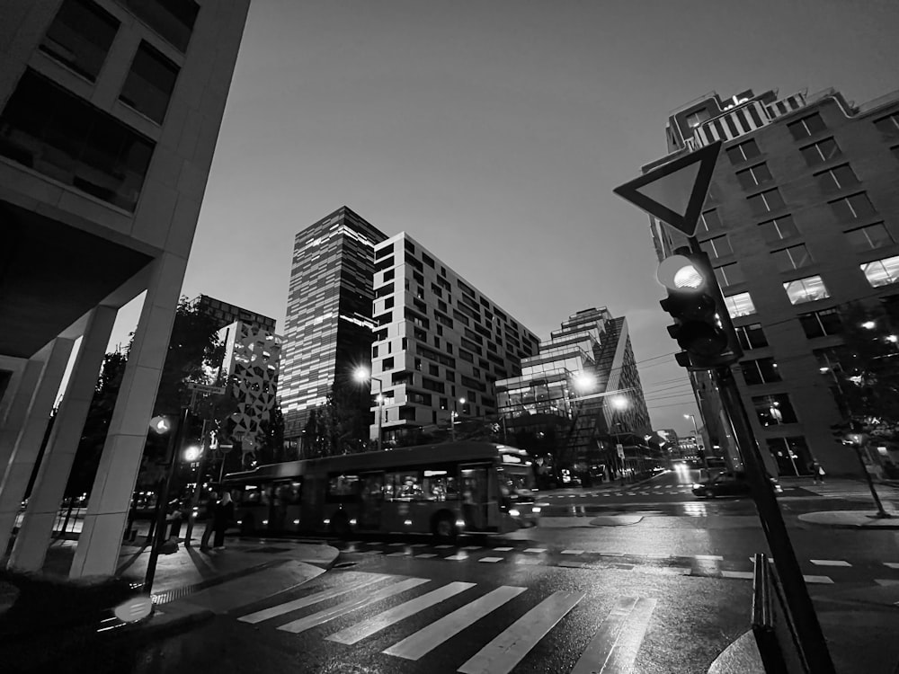 a black and white photo of a city at night