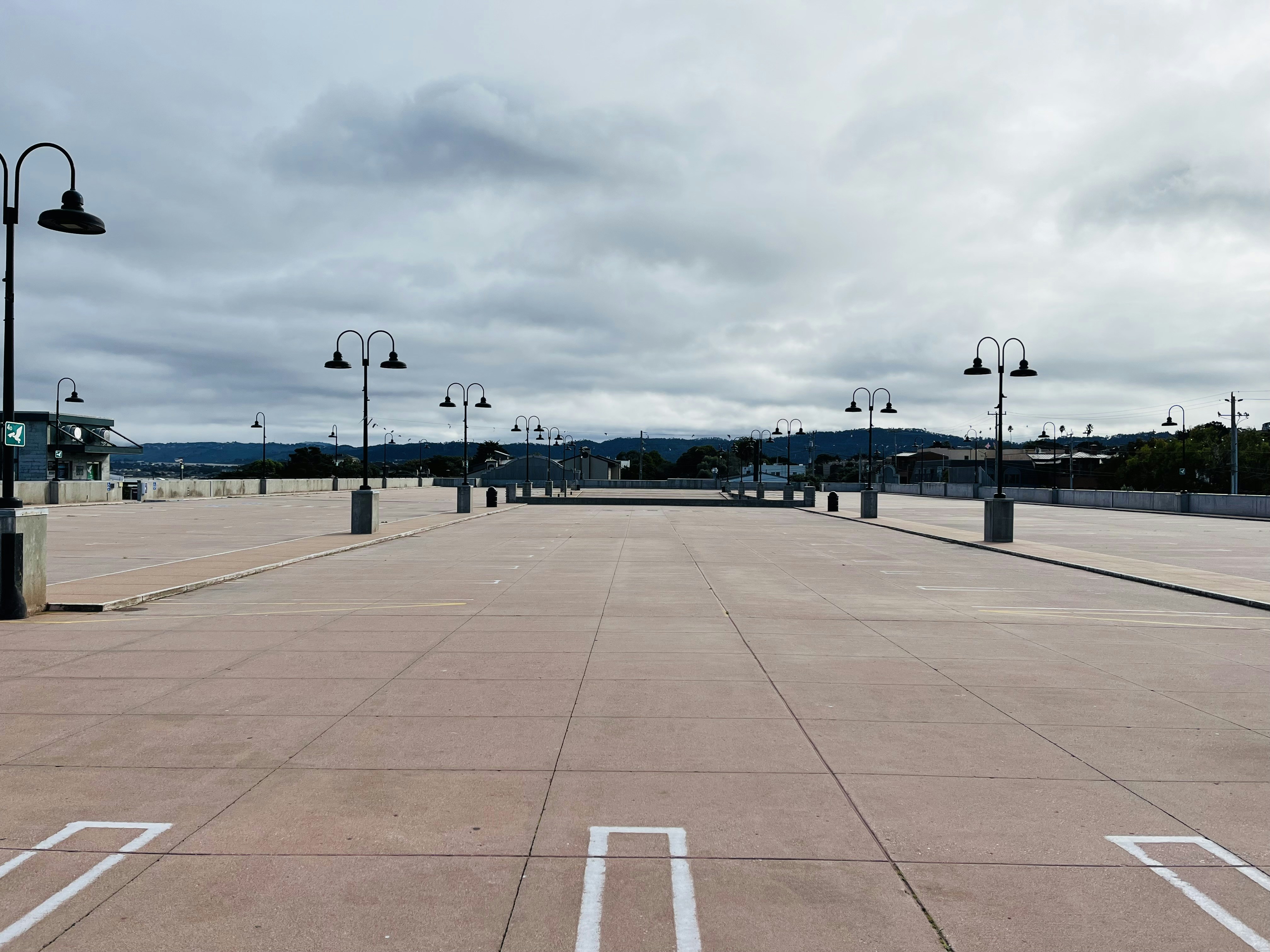 a empty parking lot with a sky background
