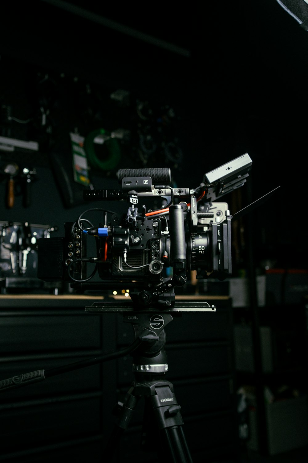 a camera on a tripod in a dark room