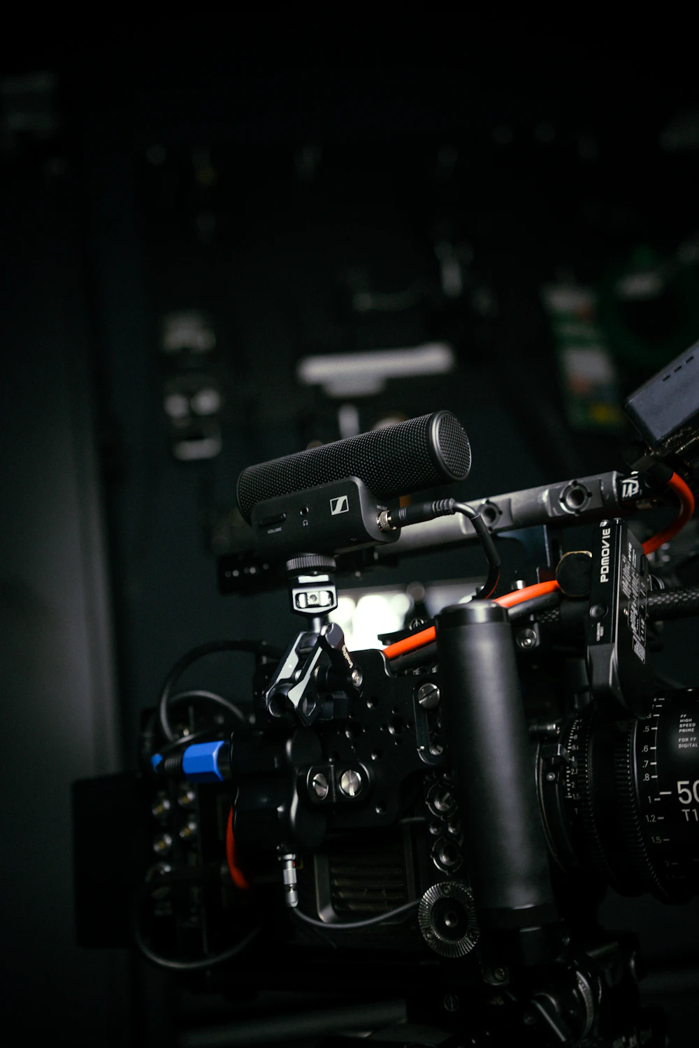 Cinema camera rigged in a dark film studio