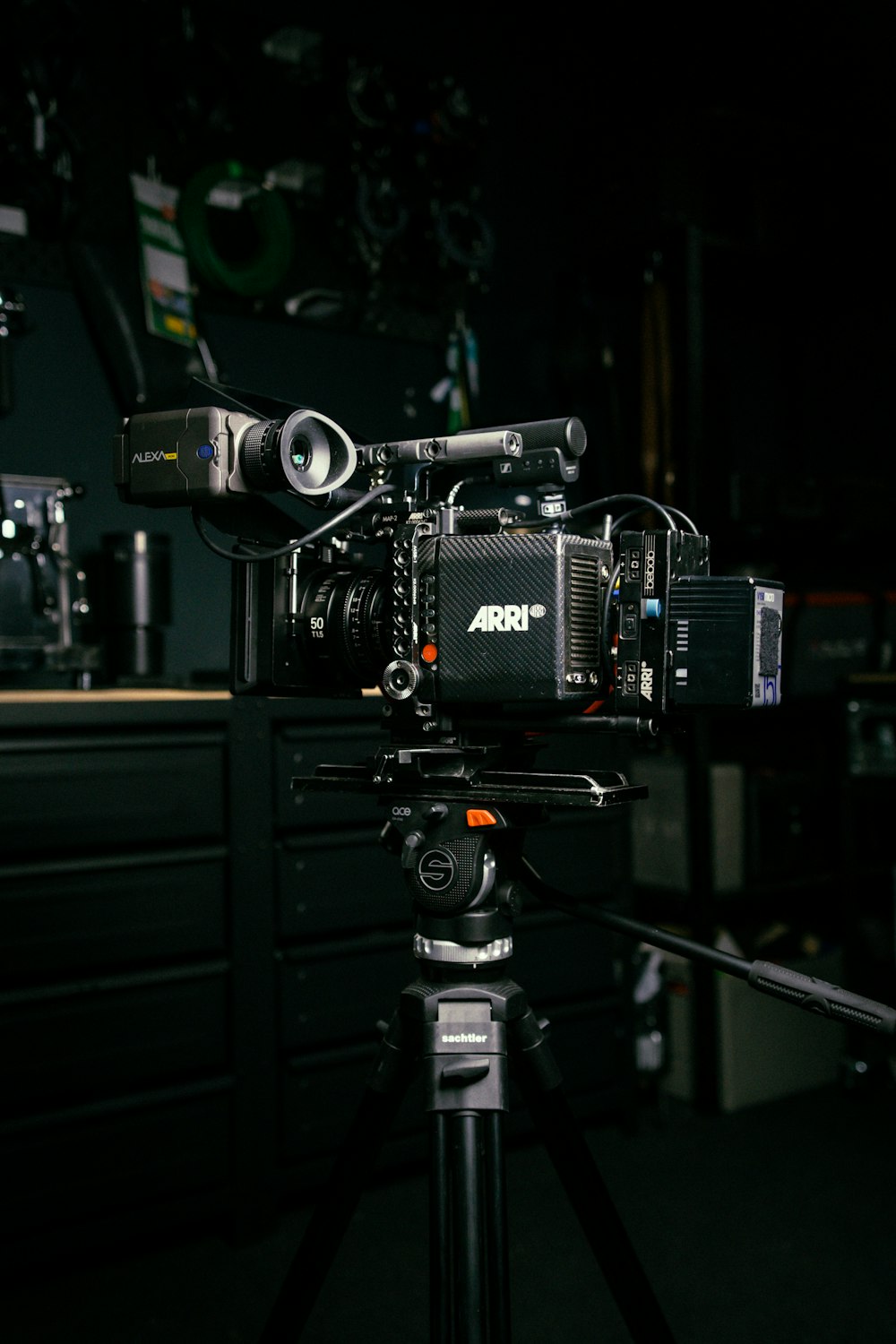 a video camera sitting on top of a tripod