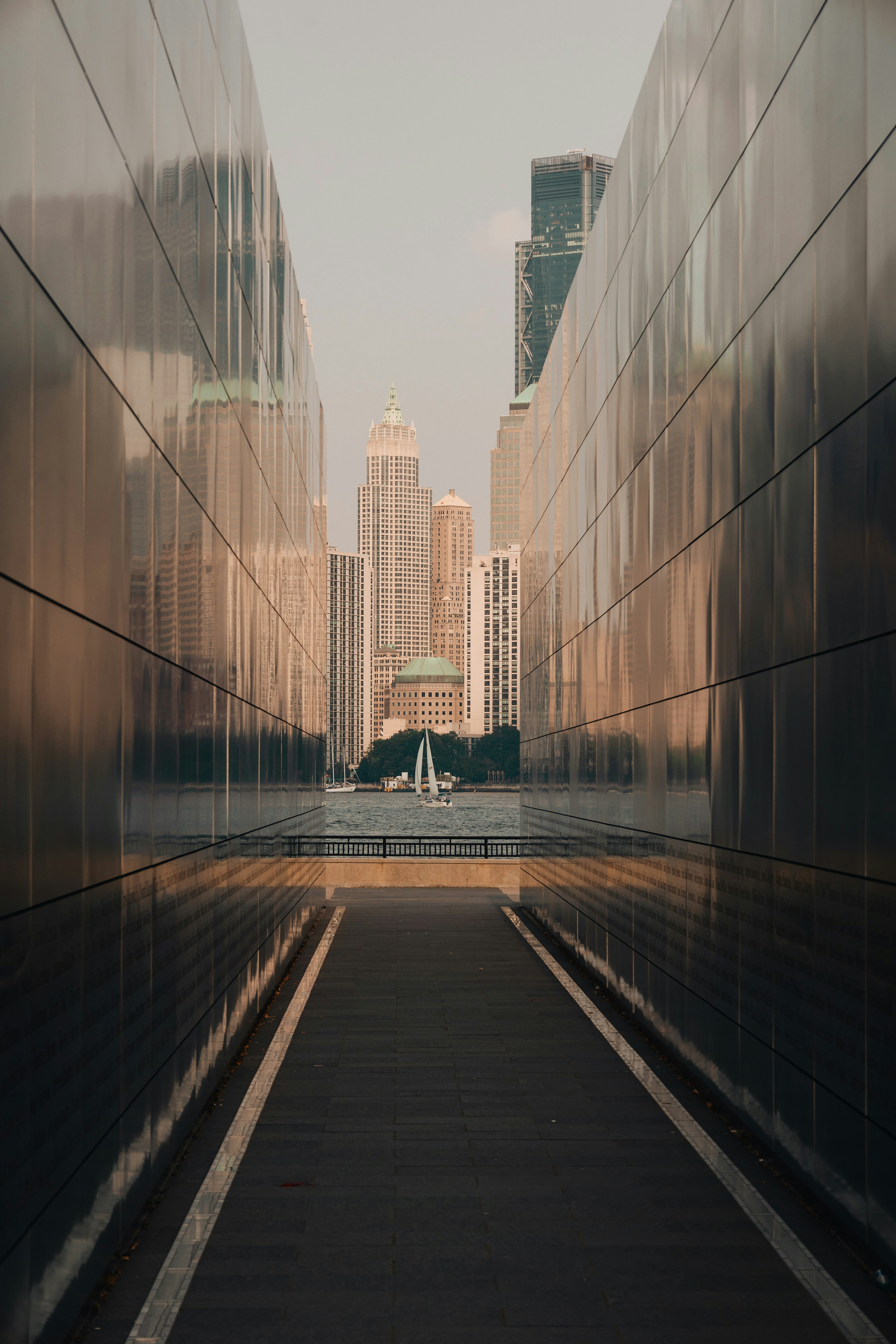 a view of a city from a walkway