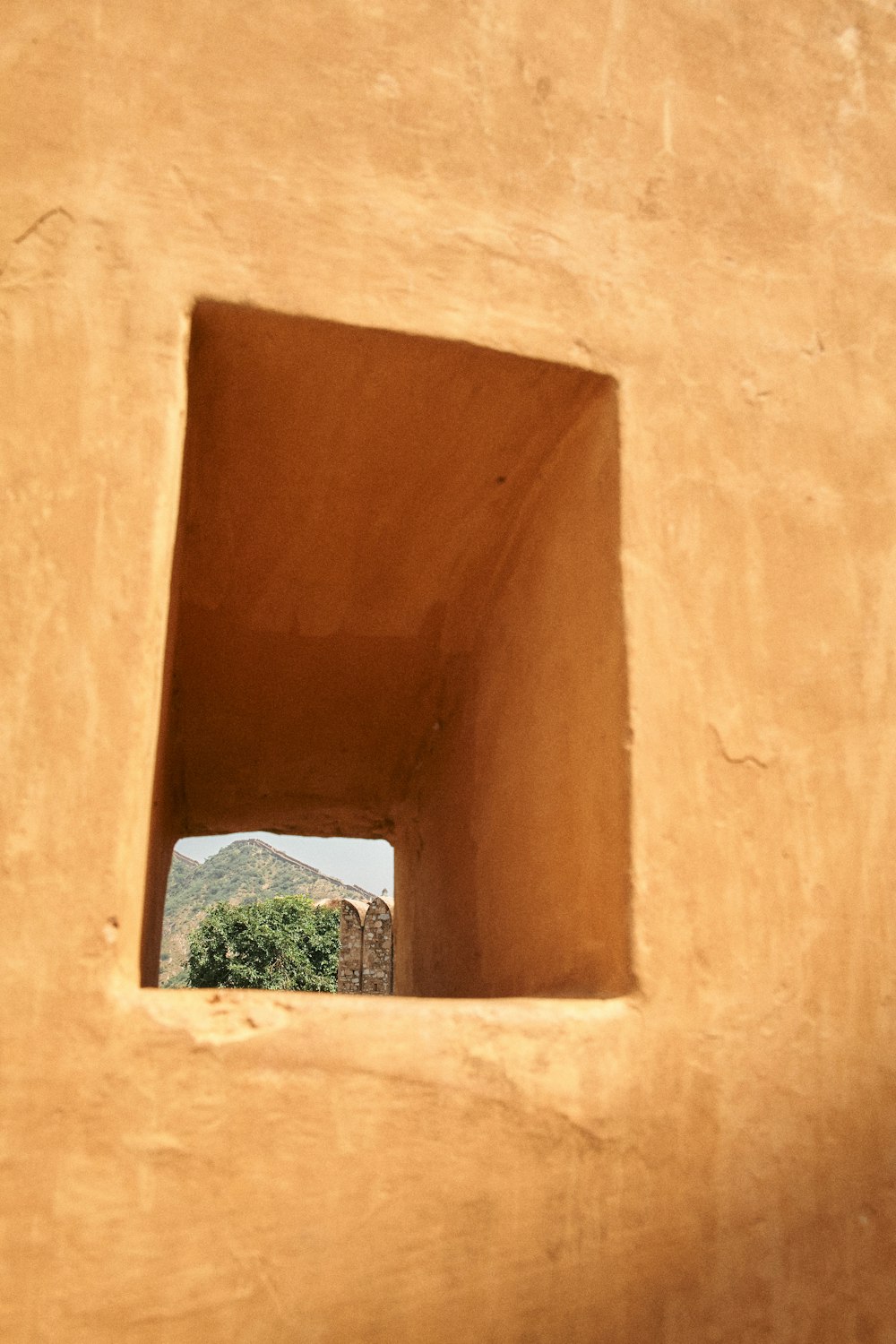 a small window in the side of a building