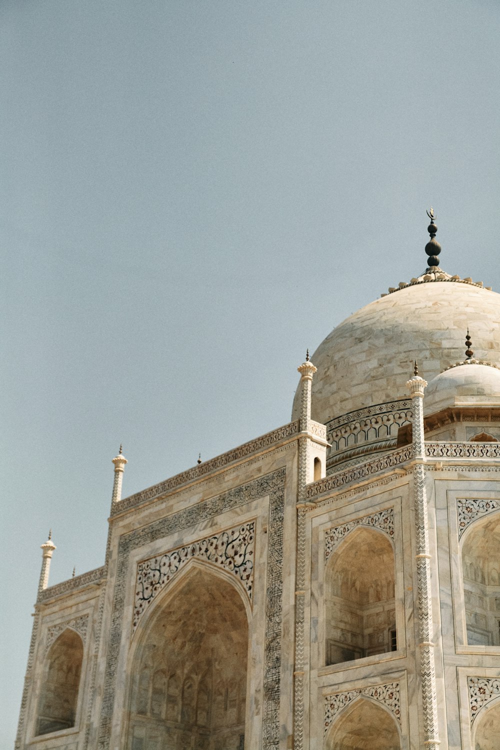 a large white building with a dome on top