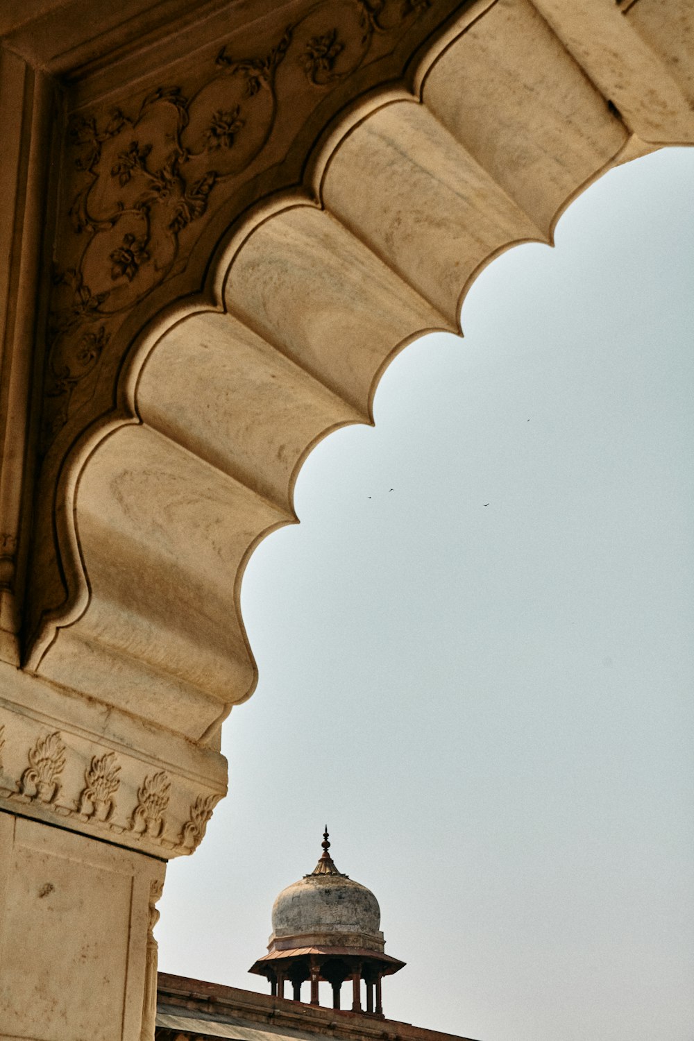 a dome on top of a building with a sky background