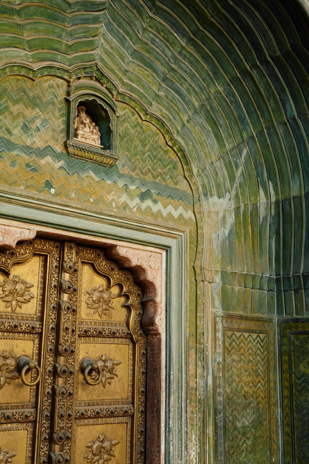 a close up of a door with a clock on it