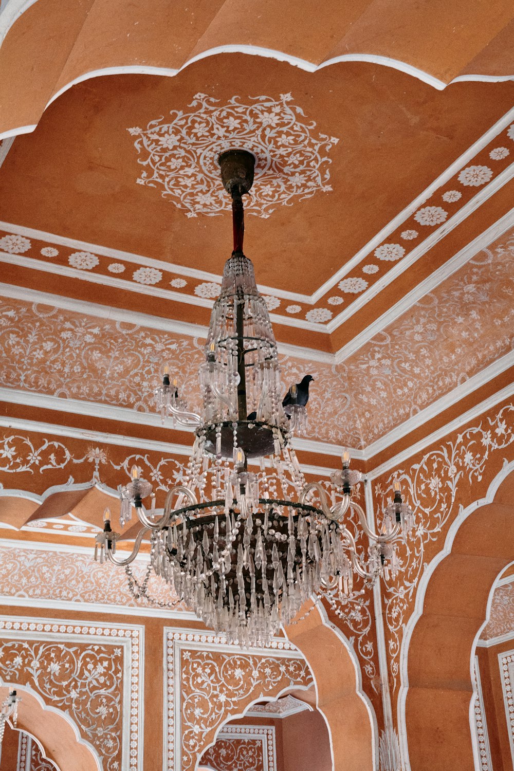 a chandelier hanging from the ceiling of a room