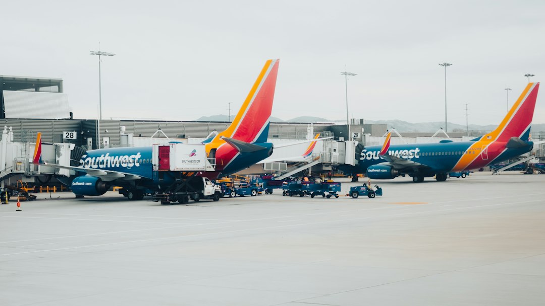 a couple of airplanes that are on a runway,