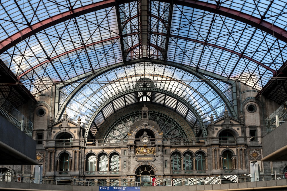 the inside of a train station with a skylight