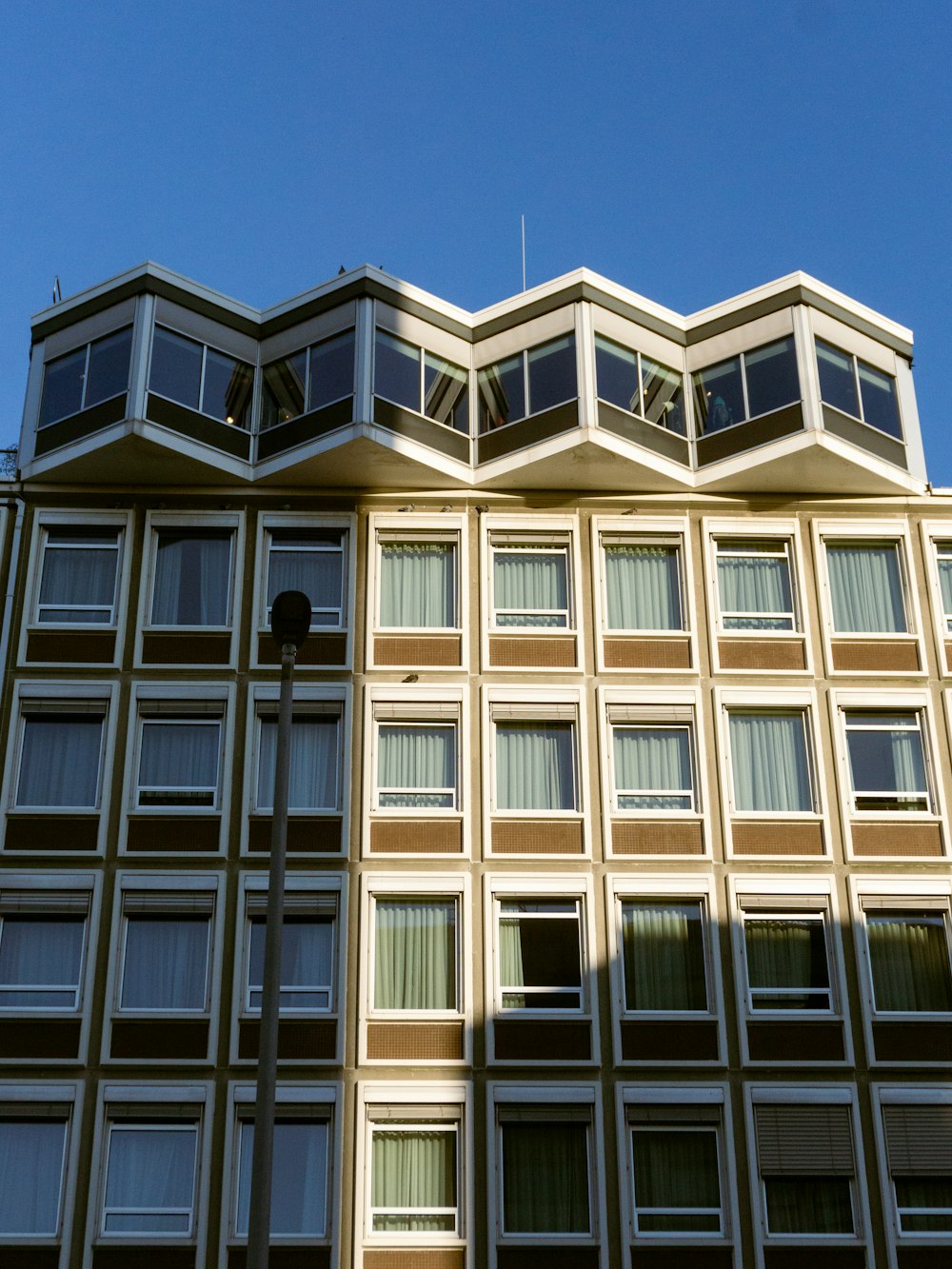 a tall building with a clock on the side of it