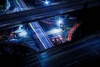 an aerial view of a city street at night