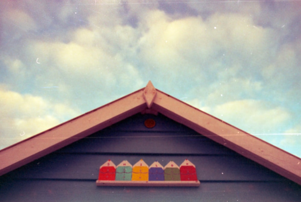 a picture of a building with a colorful roof