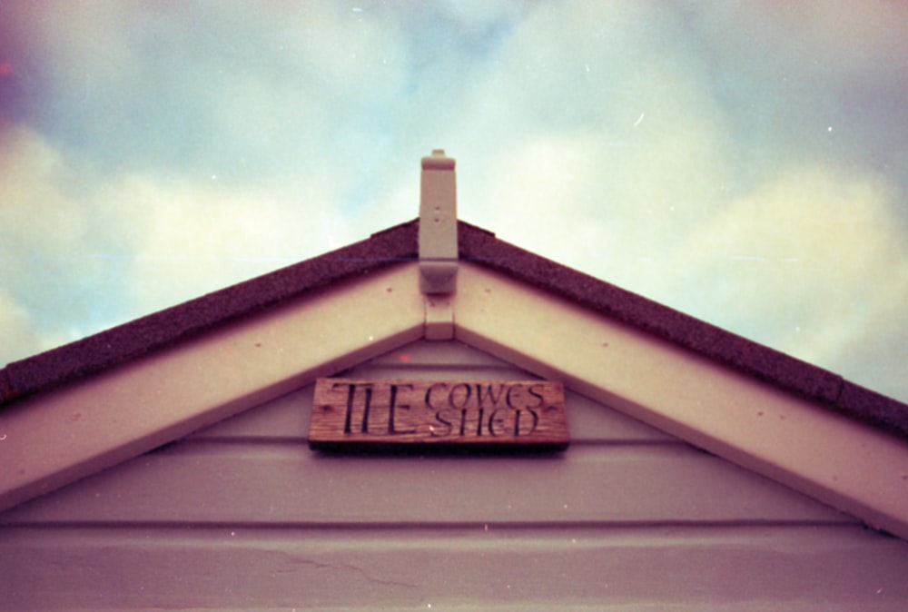a close up of a roof with a sign on it