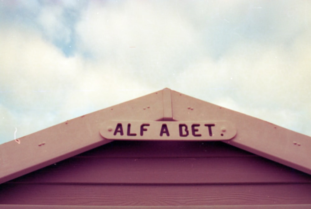 a close up of a roof with a sign on it