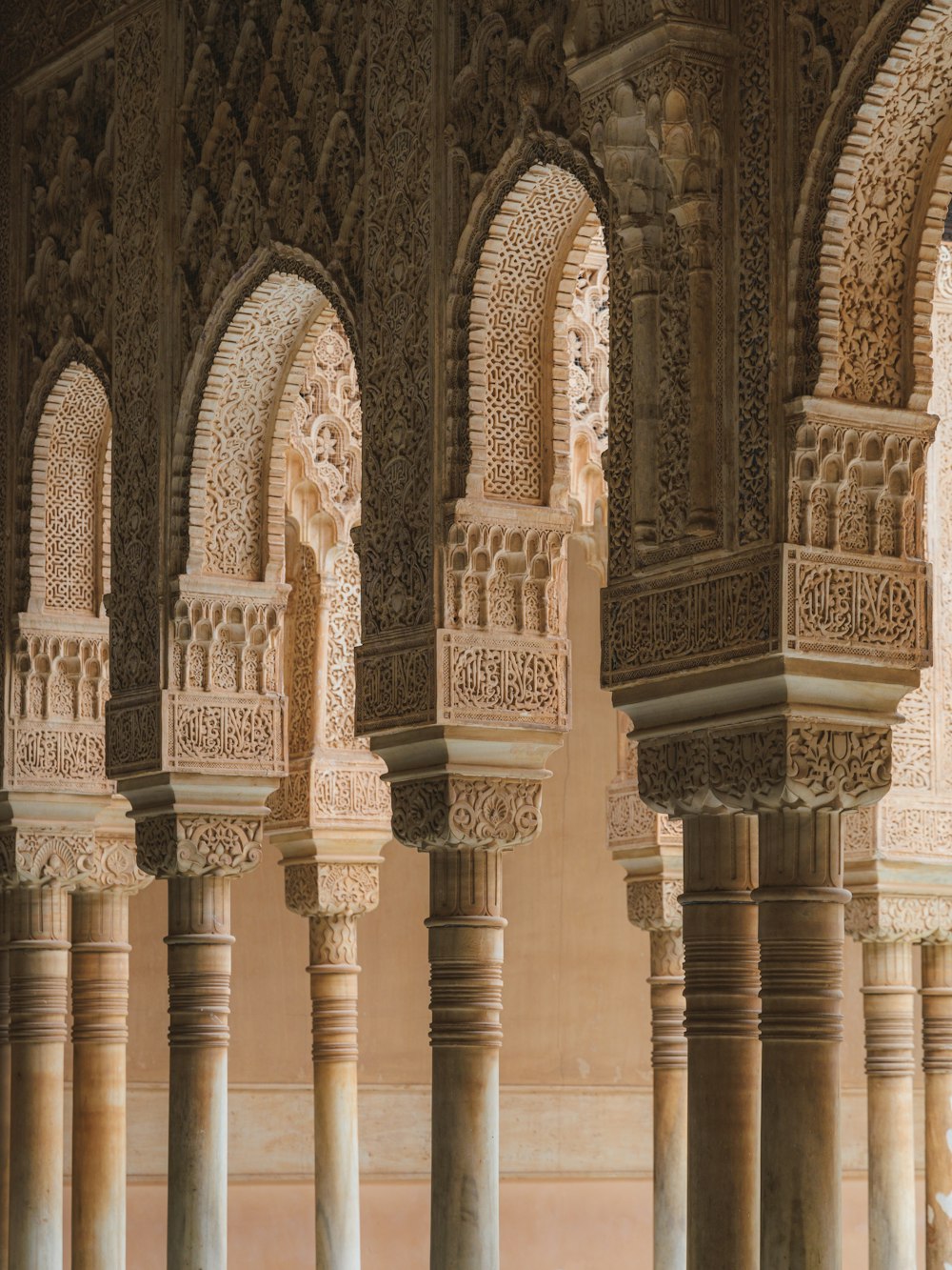 a group of stone pillars in a building