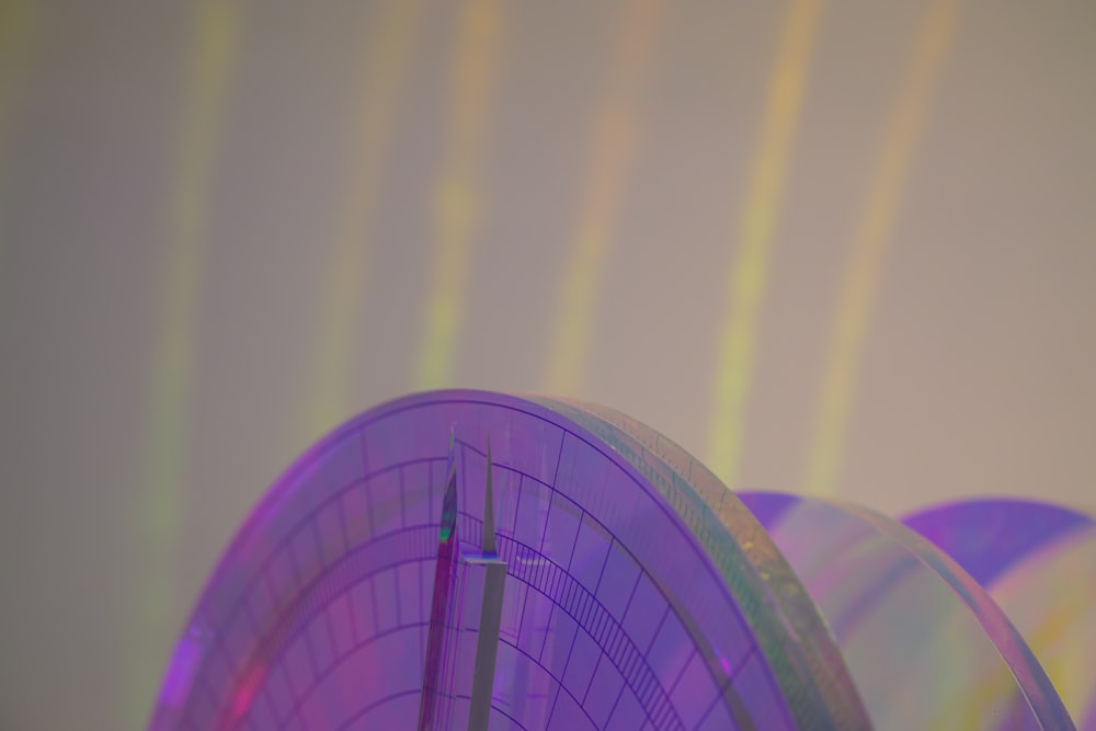 a close up of a clock tower with a sky background