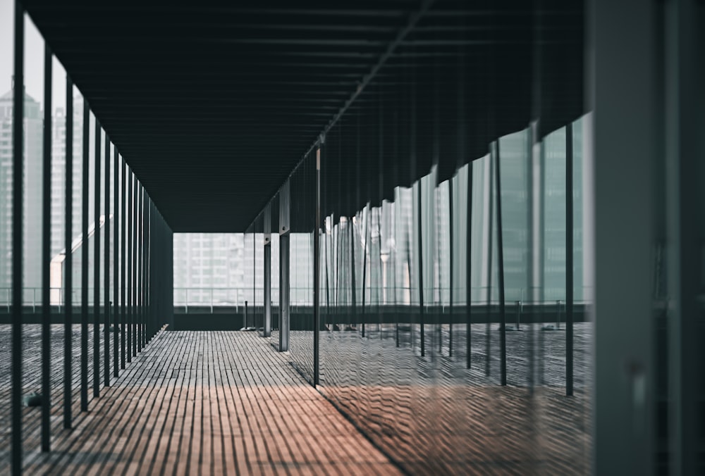 a long hallway with metal bars on the sides of it