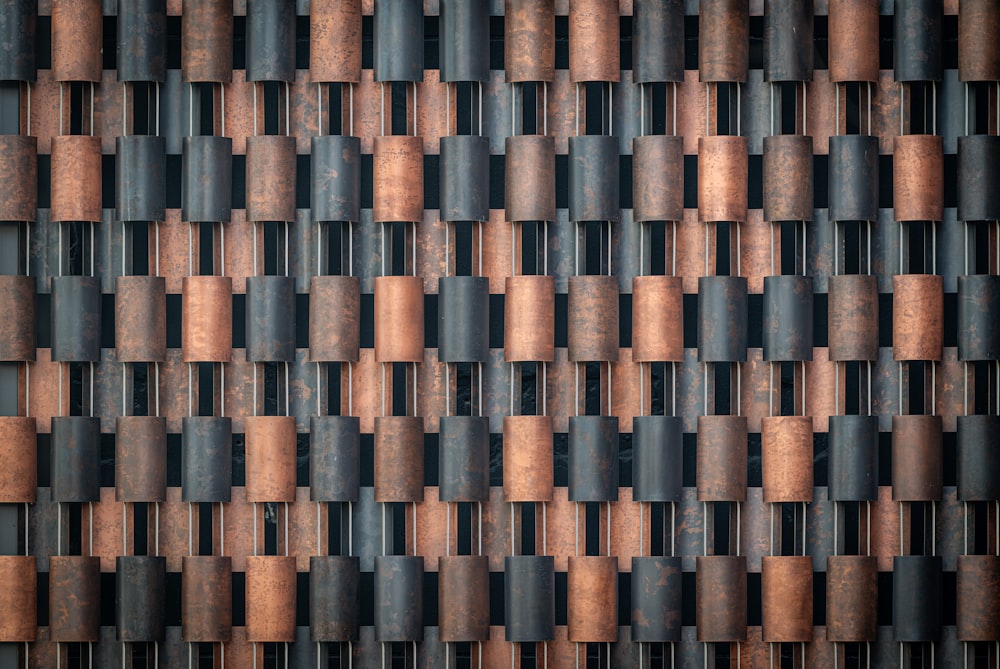 a wall made up of metal pipes