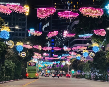 a street filled with lots of lights and decorations