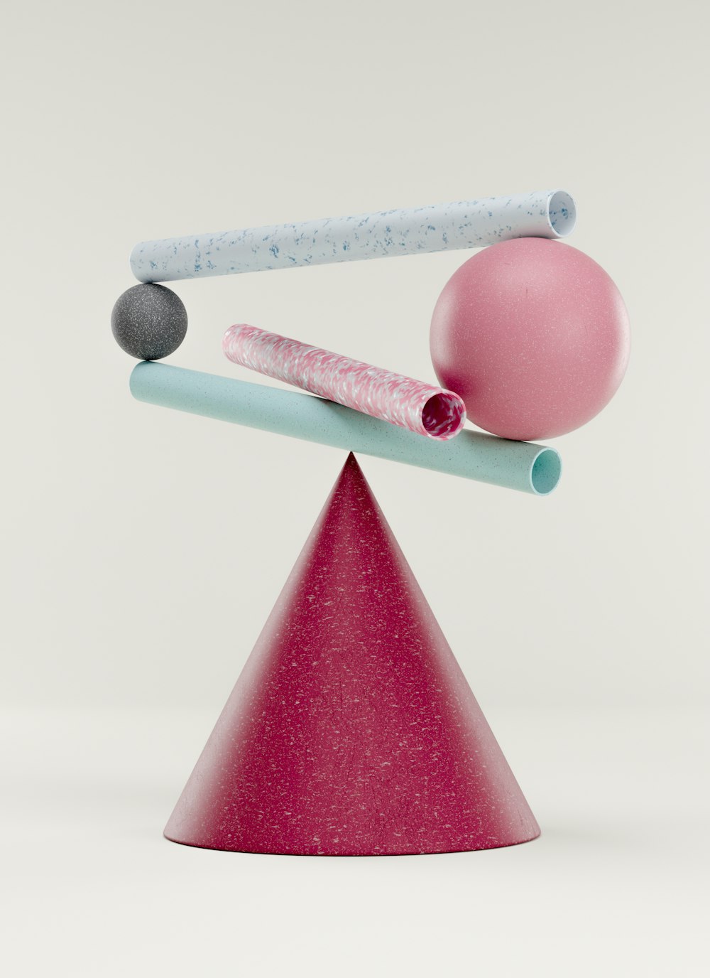 a pink cone with two balls and a ball on top of it