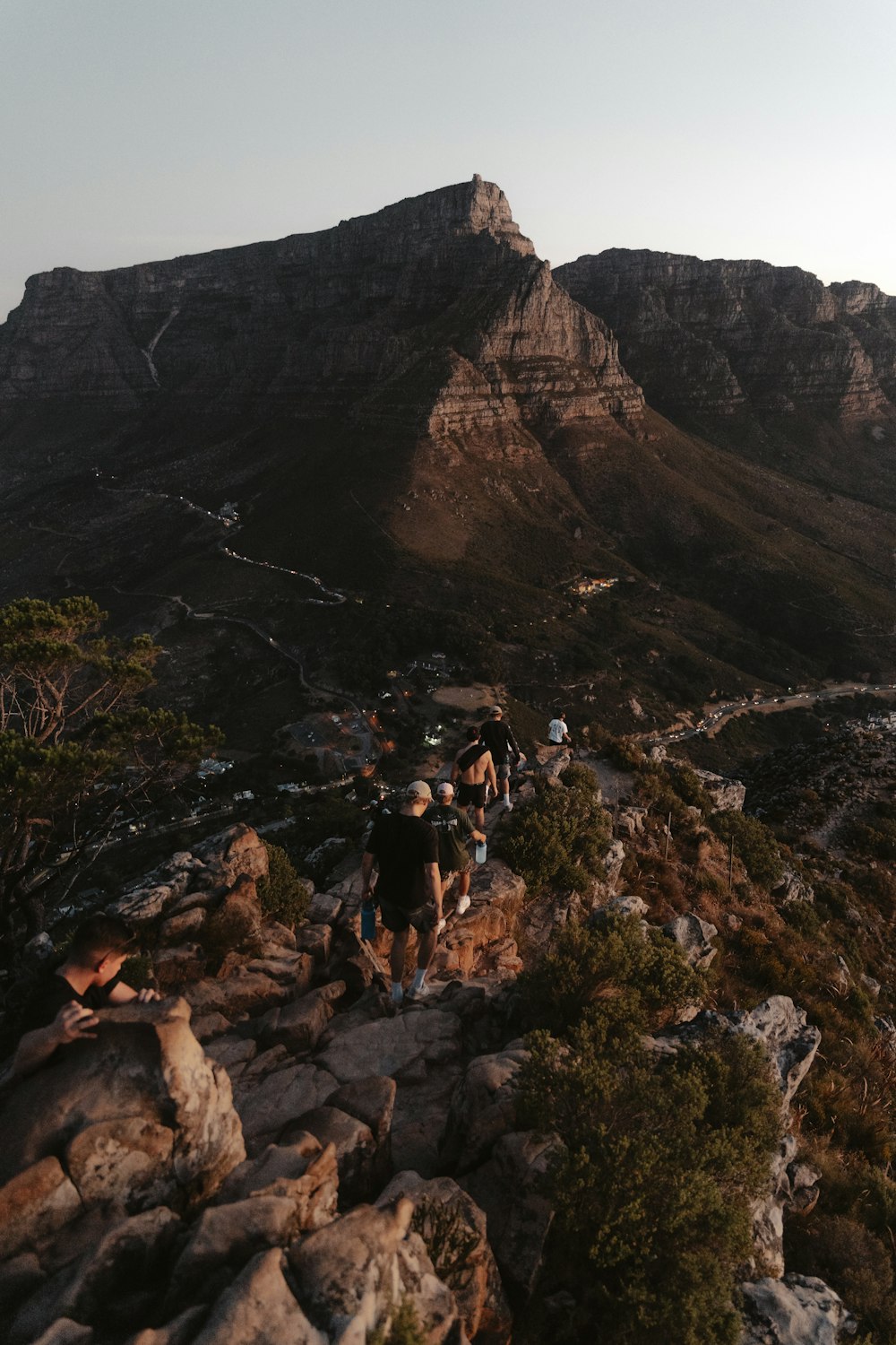 a group of people hiking up a mountain