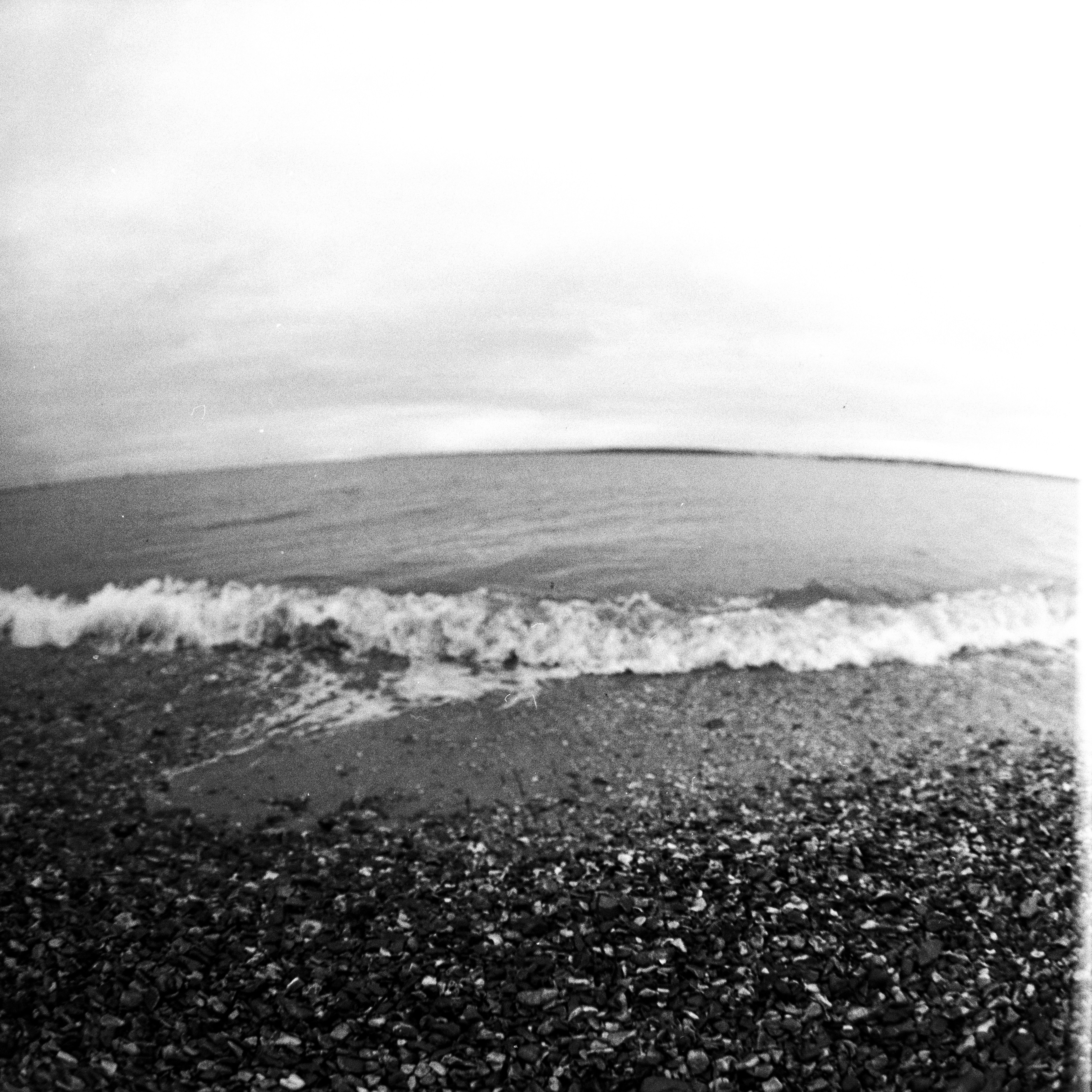 A black and white photo of the ocean photo – Free Grey Image on Unsplash