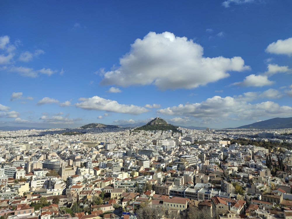 a view of a city from the top of a hill