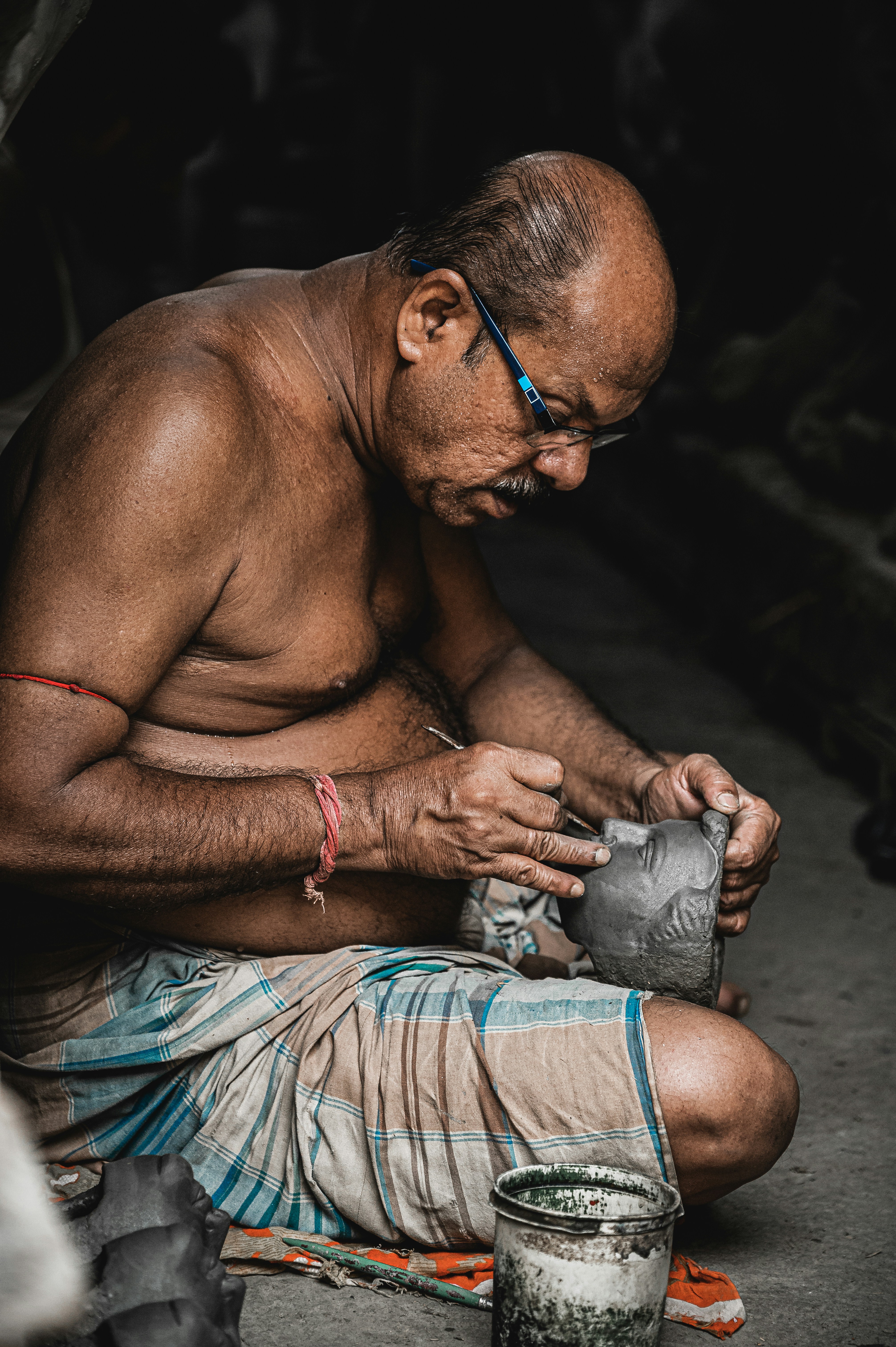 A satisfied handyman checking his finances