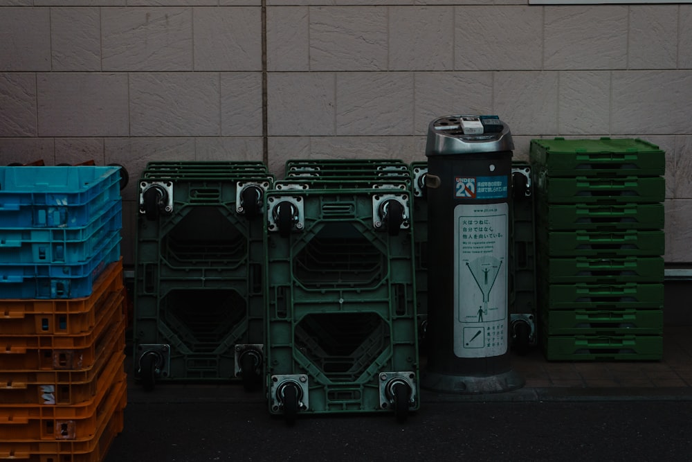 a couple of crates sitting next to a wall