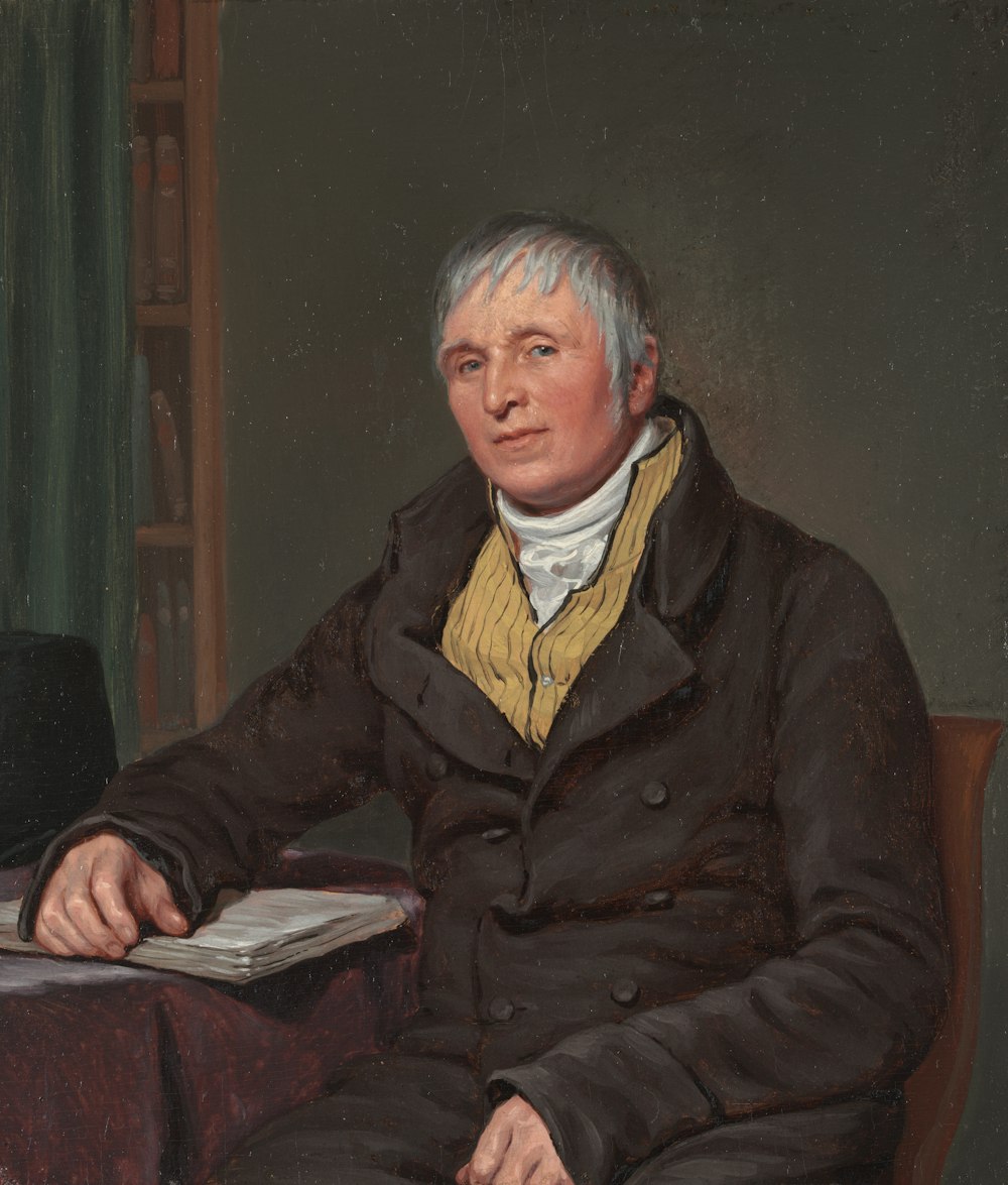 a painting of a man sitting at a table